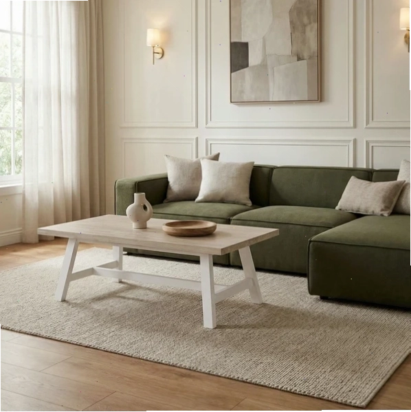 Phòng khách hiện đại với sofa xanh, bàn cà phê gỗ và tranh nghệ thuật trên tường
